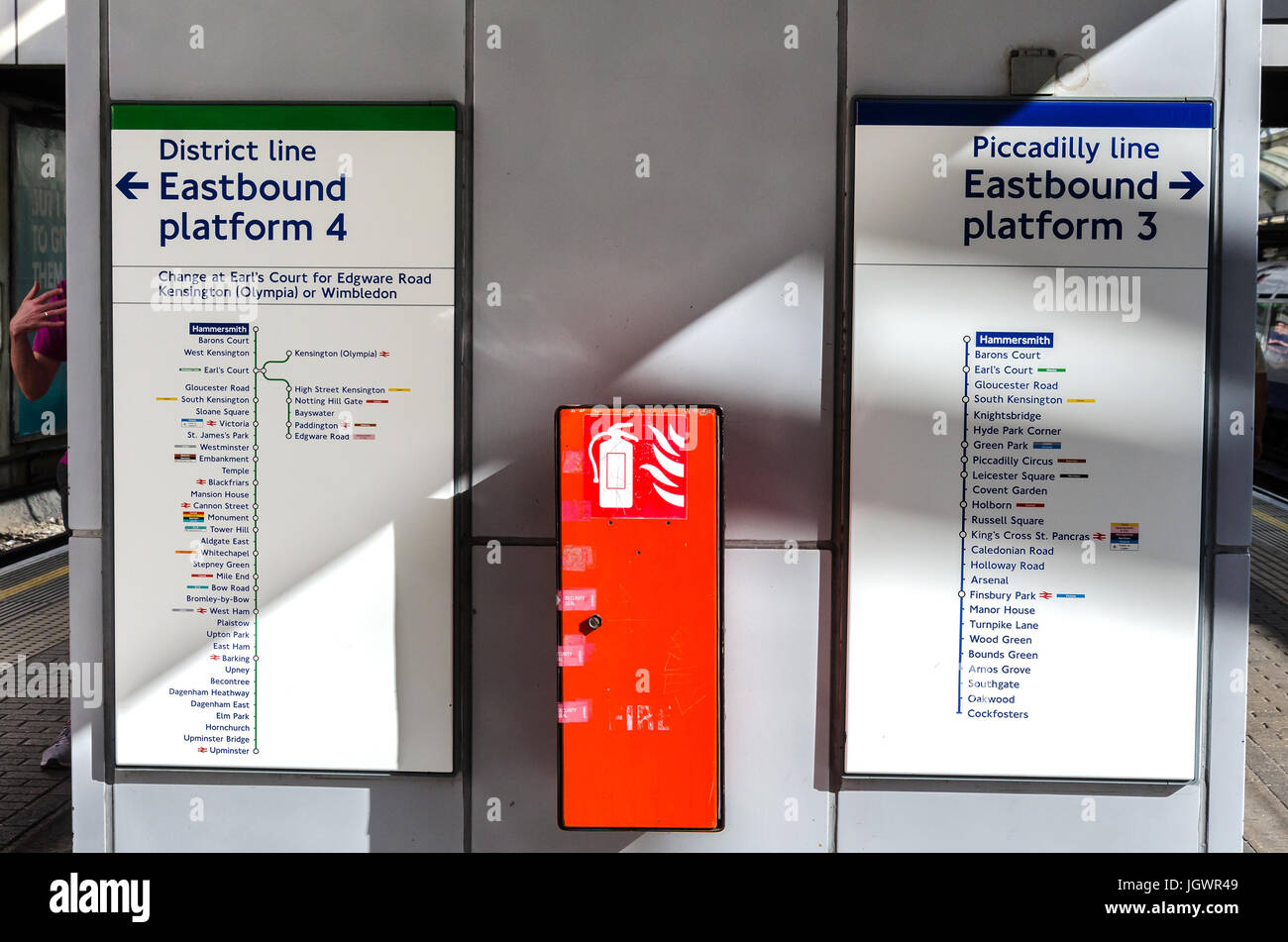 Signs on the wall at Hammersmith London Underground station allowing passengers to plan their routes Stock Photo