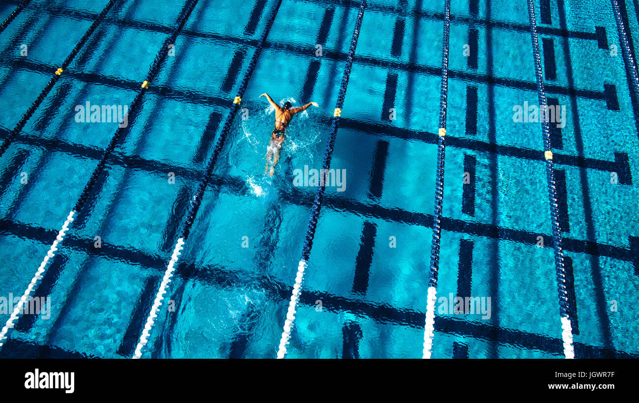 Overhead view of swimmer in pool Stock Photo