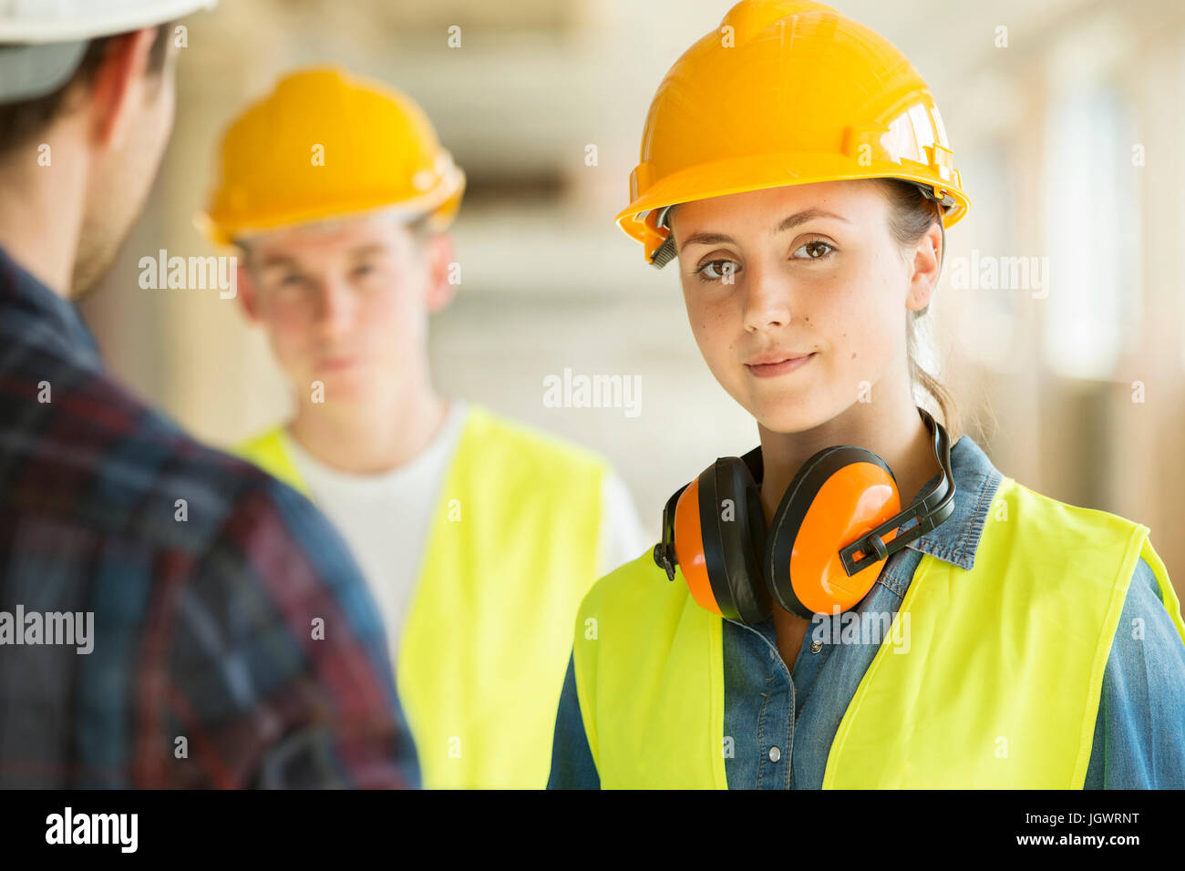 Woman wearing hard hat looking hires stock photography and images Alamy