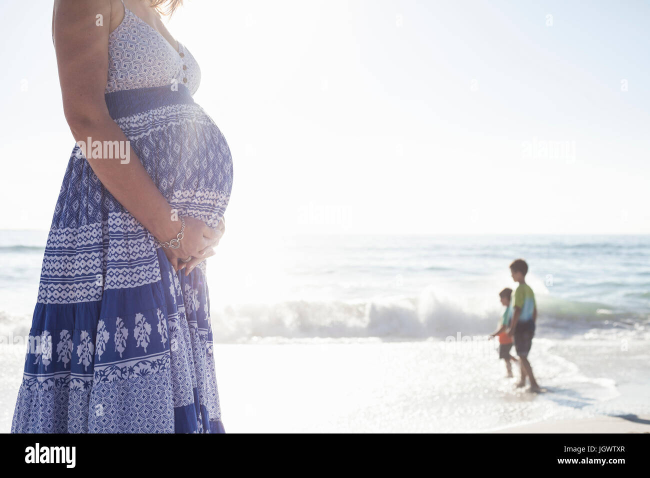 Pregnant woman on beach, Cape Town, South Africa Stock Photo