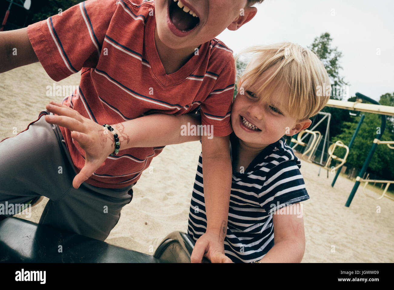Two boys laughing hi-res stock photography and images - Alamy