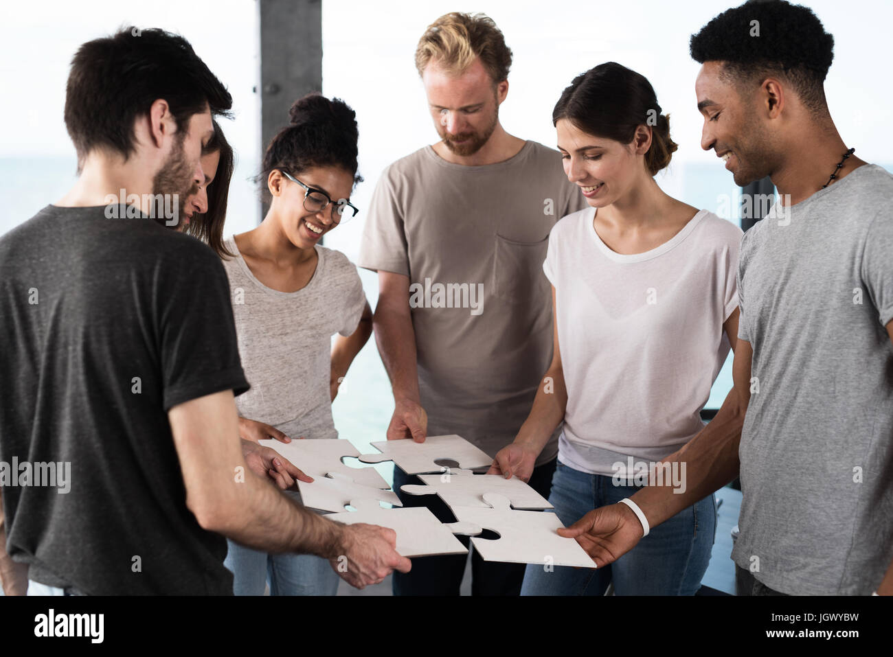 Team of businessmen work together for one goal. Concept of unity and partnership Stock Photo