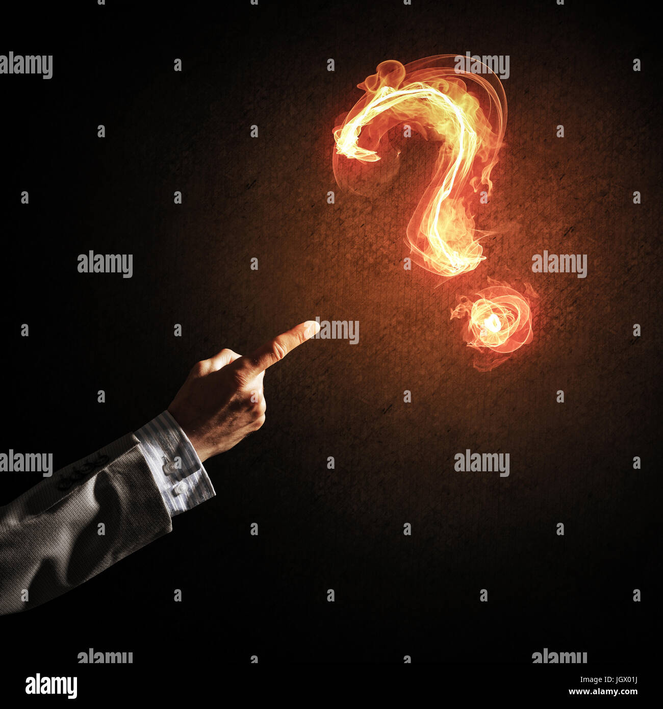 Concept of help or support with fire burning question mark Stock Photo