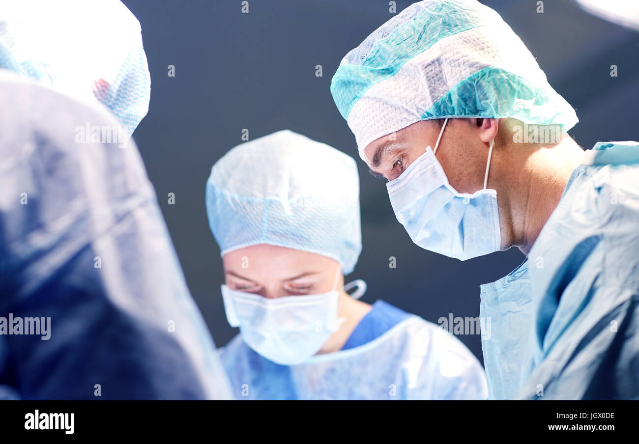 group of surgeons in operating room at hospital Stock Photo - Alamy