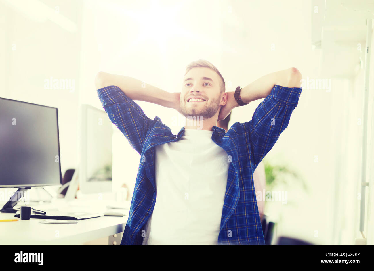 happy creative man with computer at office Stock Photo - Alamy