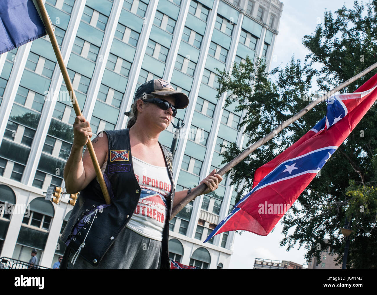 Colombia, South Carolina, USA. 10th Jul, 2017. A few dozen of Confederacy supporters displayed their loyalty to the Confederate flag during the Confederate flag raising event held by the South Carolina Secessionist Party in protest of the two year anniversary of the Confederate Battle Flag's removal from the South Carolina State House Grounds in 2015. The flag which was hoisted on a portable flag pole at 10 a.m. was to be removed from the South Carolina State House Grounds at 5 p.m. Credit: Crush Rush/Alamy Live News Stock Photo