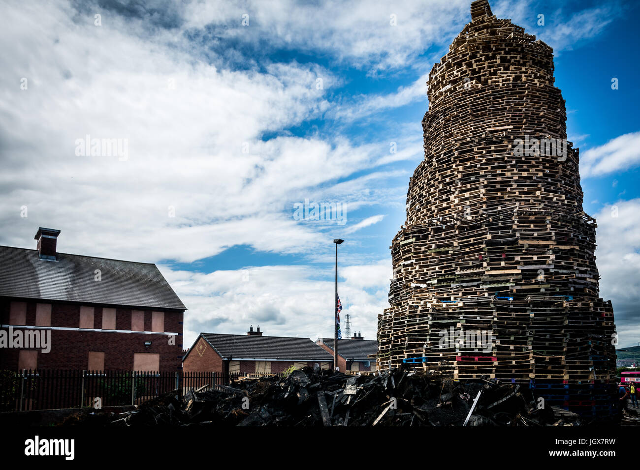 A large loyalist bonfire built close to homes in East Belfast Stock Photo