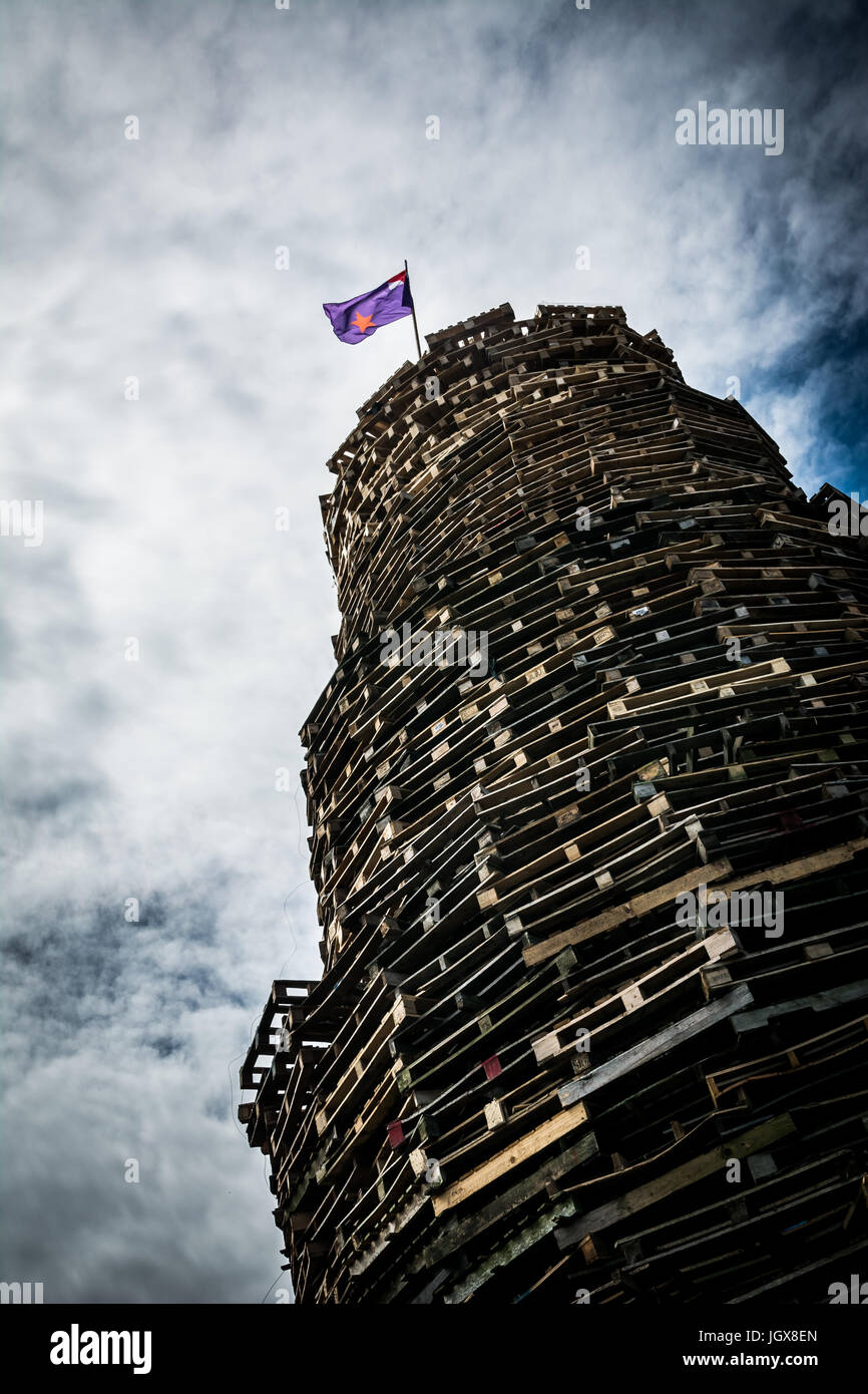 East Belfast, Ireland. 11th July, 2017. Large loyalist bonfire situated at the Walkway, Ravenscroft Avenue in East Belfast. Credit: DMc Photography/Alamy Live News Stock Photo