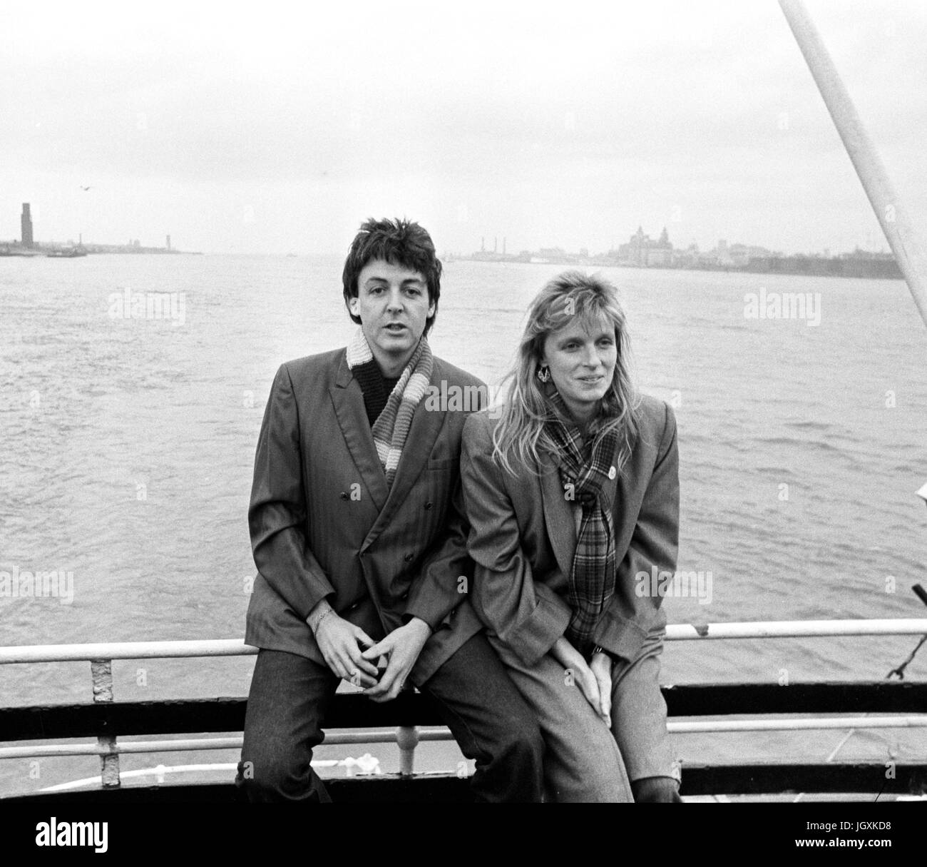 Former Beatle Paul McCartney takes the 'Royal Iris' ferry across the River Mersey with his wife, Linda, during a nostalgic trip around his native city. Stock Photo
