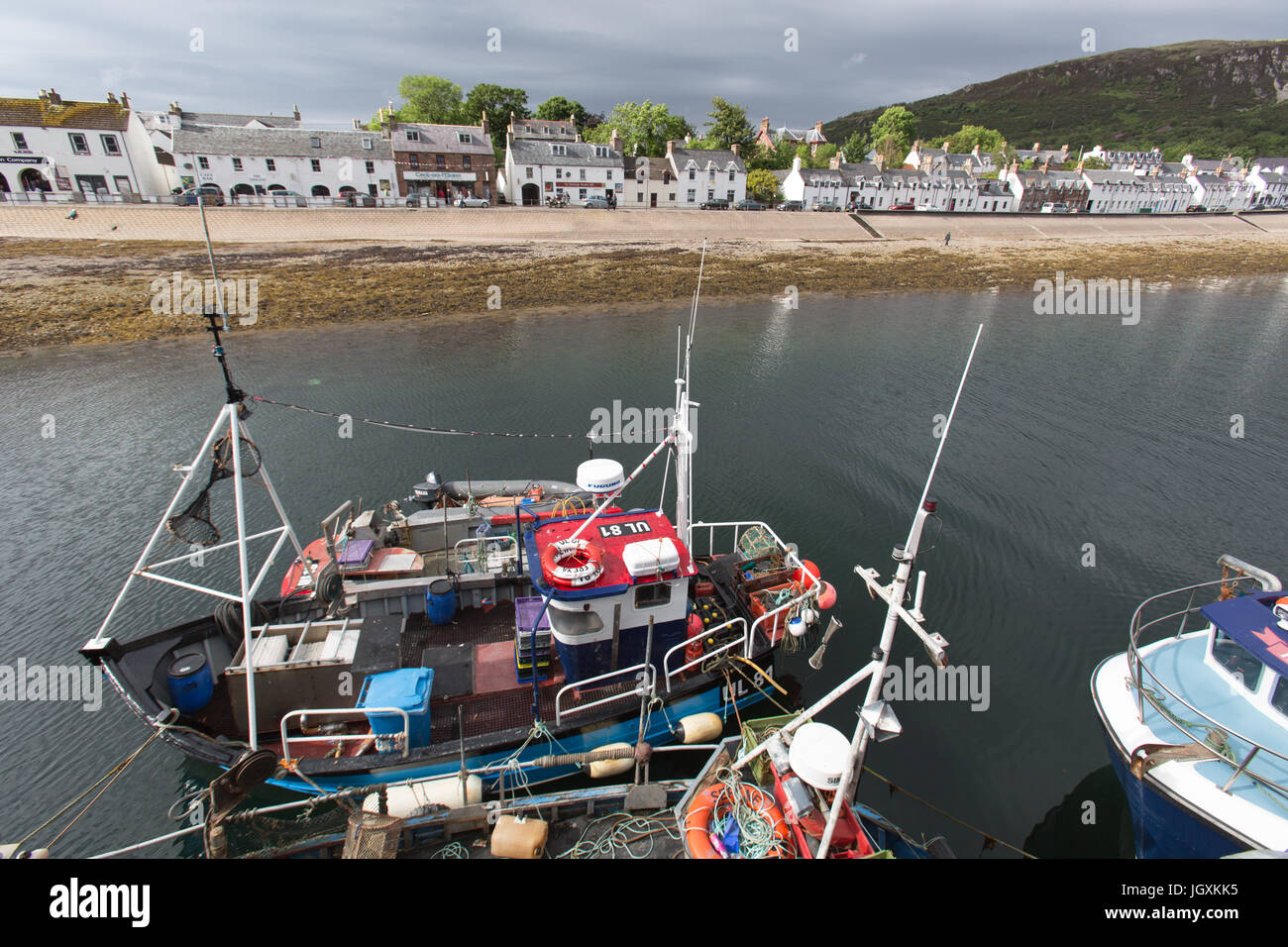 Town of Ullapool, Scotland. Picturesque view of Ullapool’s harbour and waterfront, with Shore Street in the background. Stock Photo