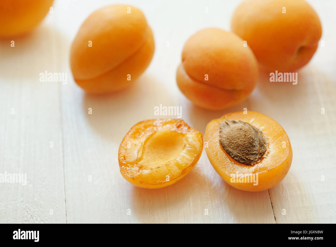 Apricot with leaf isolated on white background Stock Photo - Alamy
