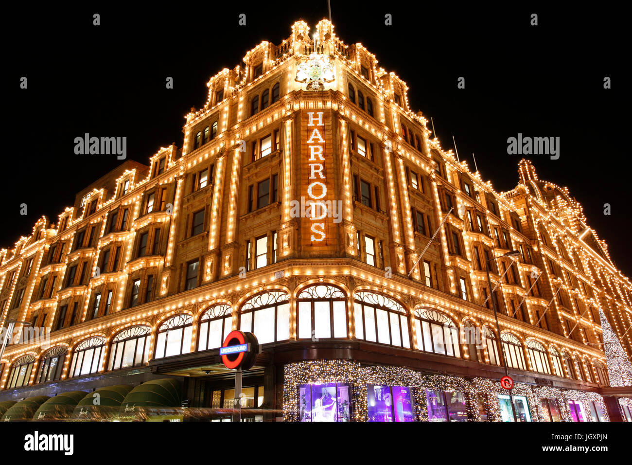 LONDON - DEC 8 : Night View of Harrods with christmas decoration ...