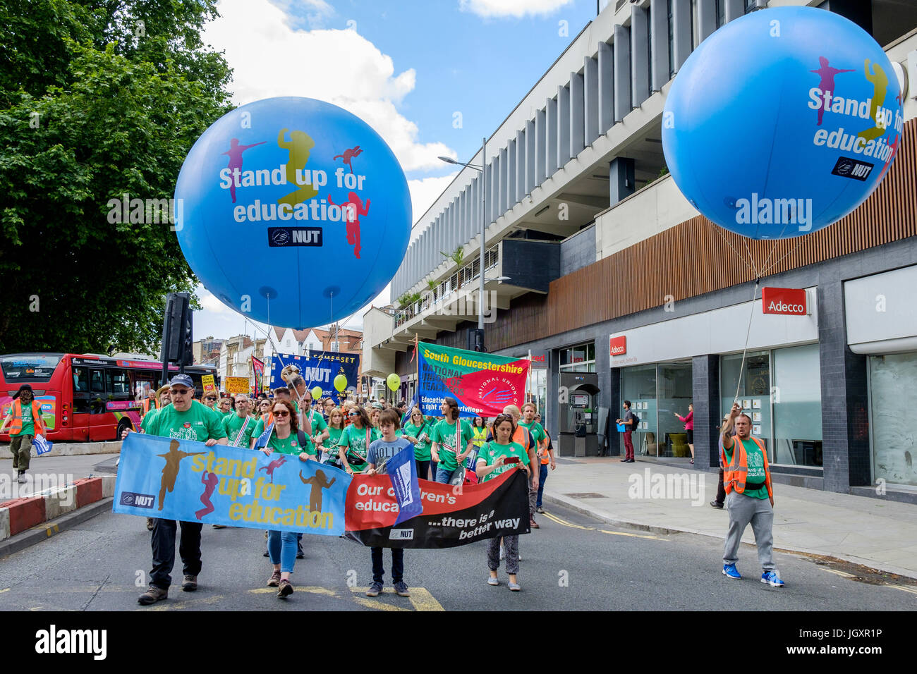 Bristol, UK, 5th July, 2016. Striking teachers and their supporters are pictured as they make their way through the city centre during a march and ral Stock Photo