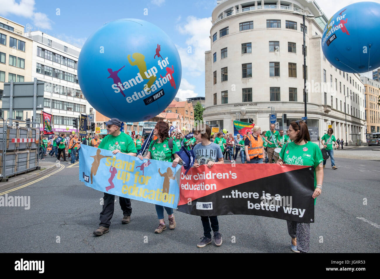 Bristol, UK, 5th July, 2016. Striking teachers and their supporters are pictured as they make their way through the city centre during a march and ral Stock Photo