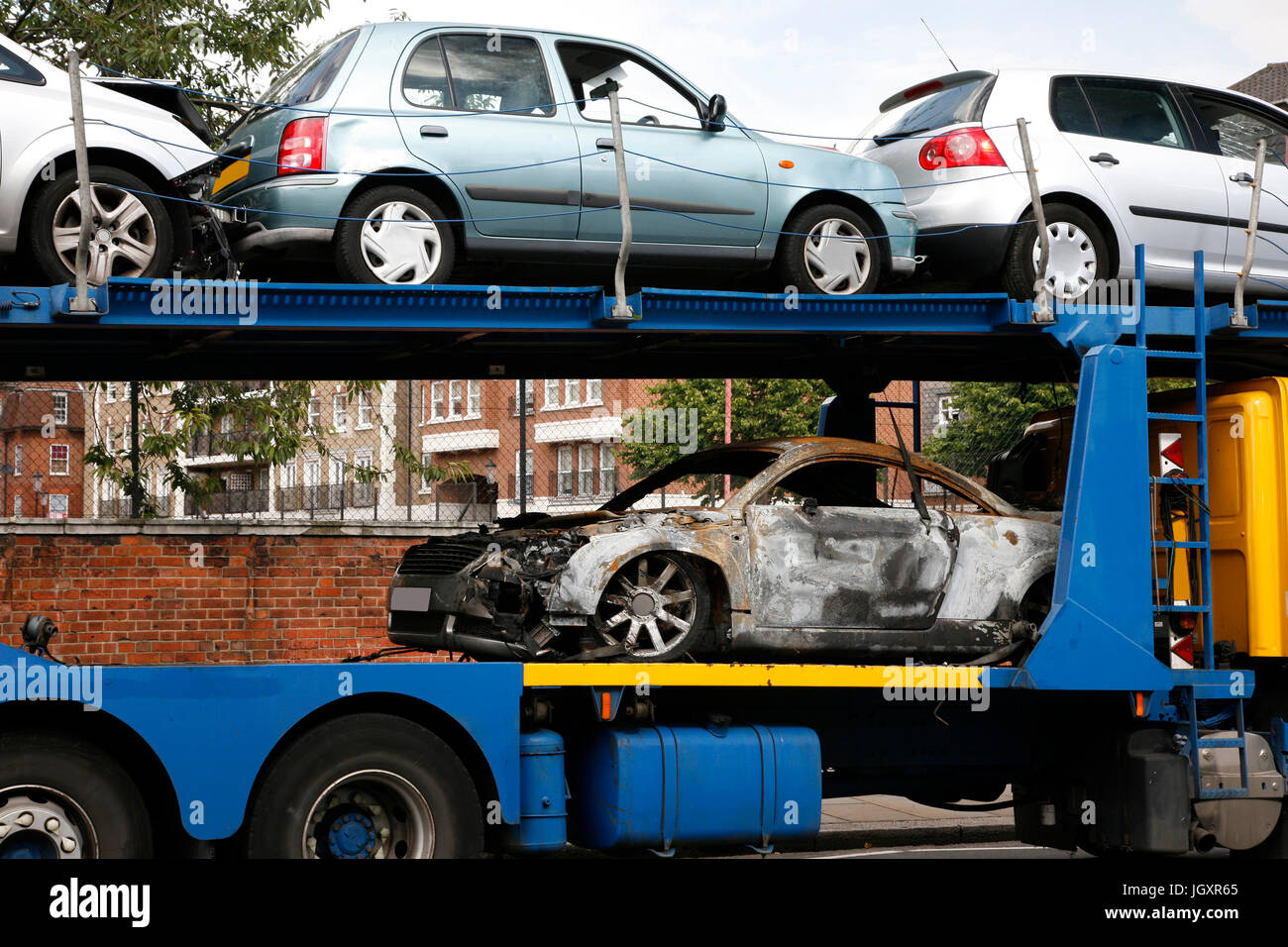 Car Accident tow truck towing the cars away Stock Photo - Alamy