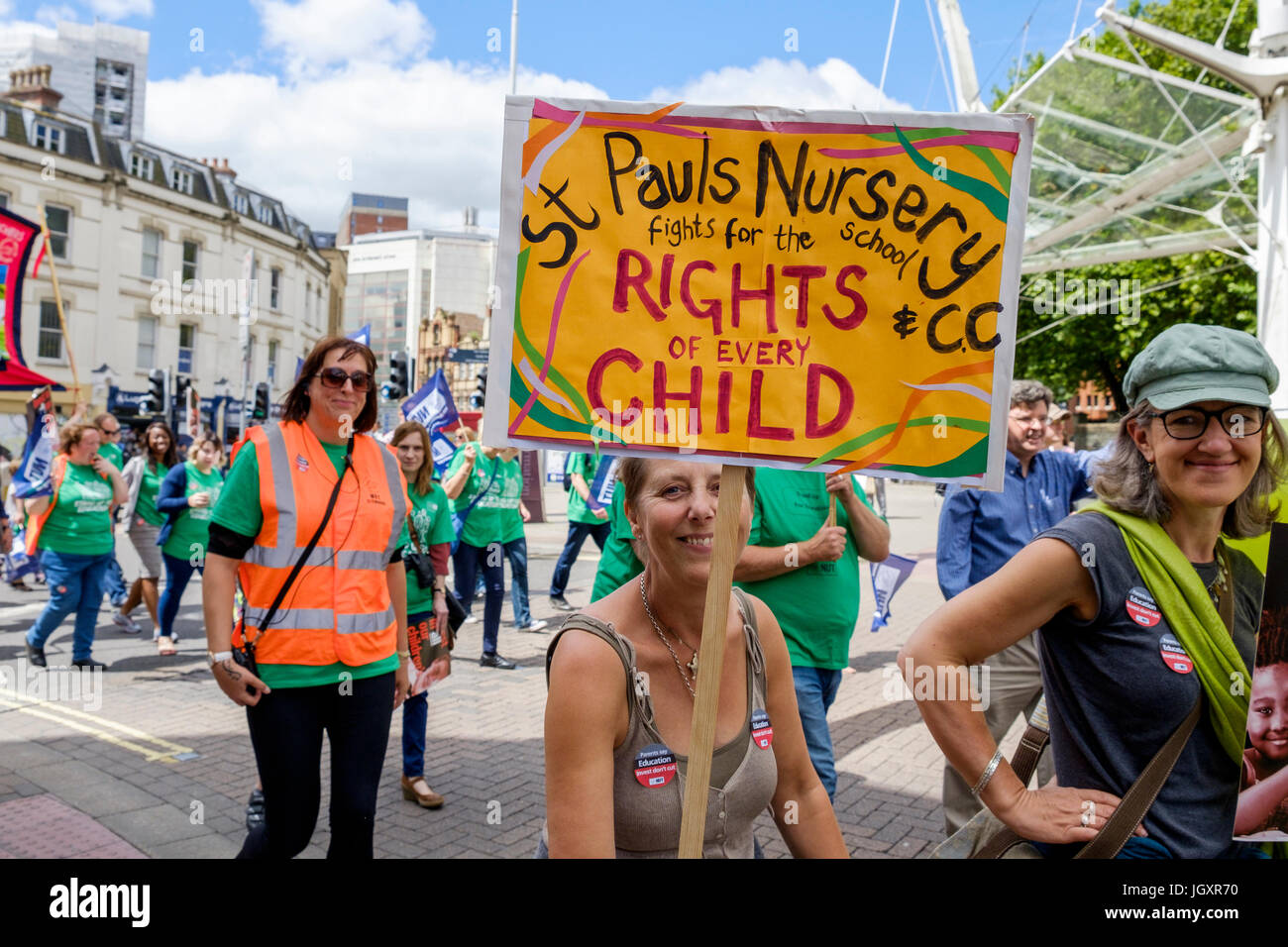 Bristol, UK, 5th July, 2016. Striking teachers and their supporters are pictured as they make their way through the city centre during a march Stock Photo