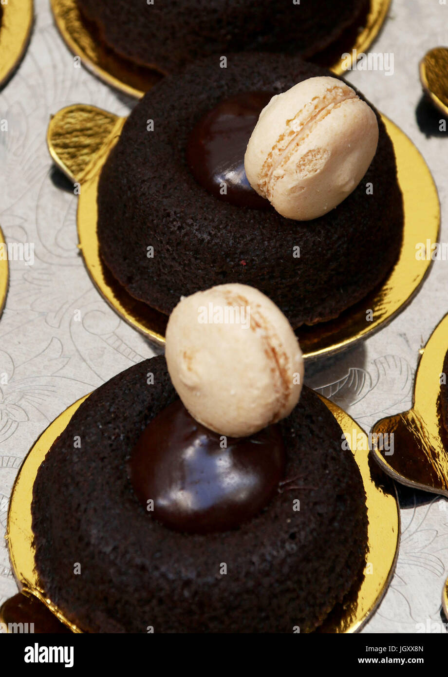 Gluten free brownies, dab of chocolate fudge, with vanilla creme cookies Stock Photo