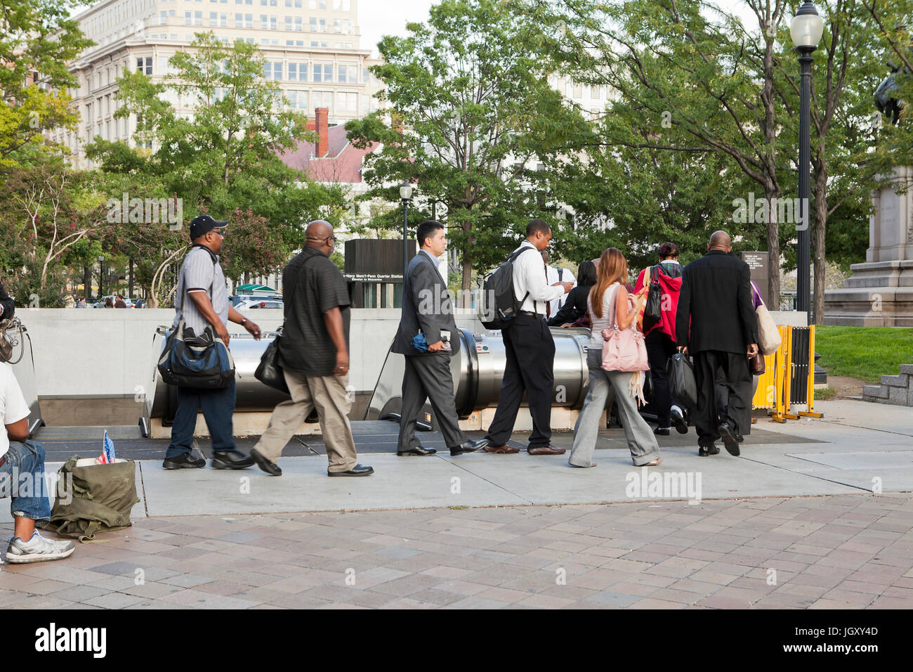 Metro riders in queue to ride on station escalator - Washington, DC USA ...