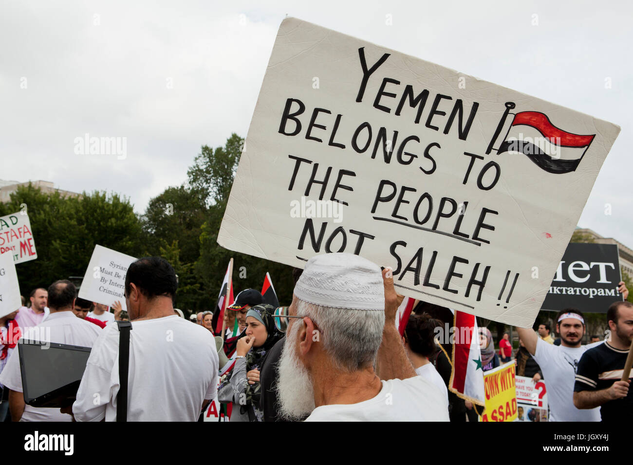 September 24, 2011: Yemeni-American  protester holding sign against Yemeni president Ali Abdullah Saleh - Washington, DC USA Stock Photo