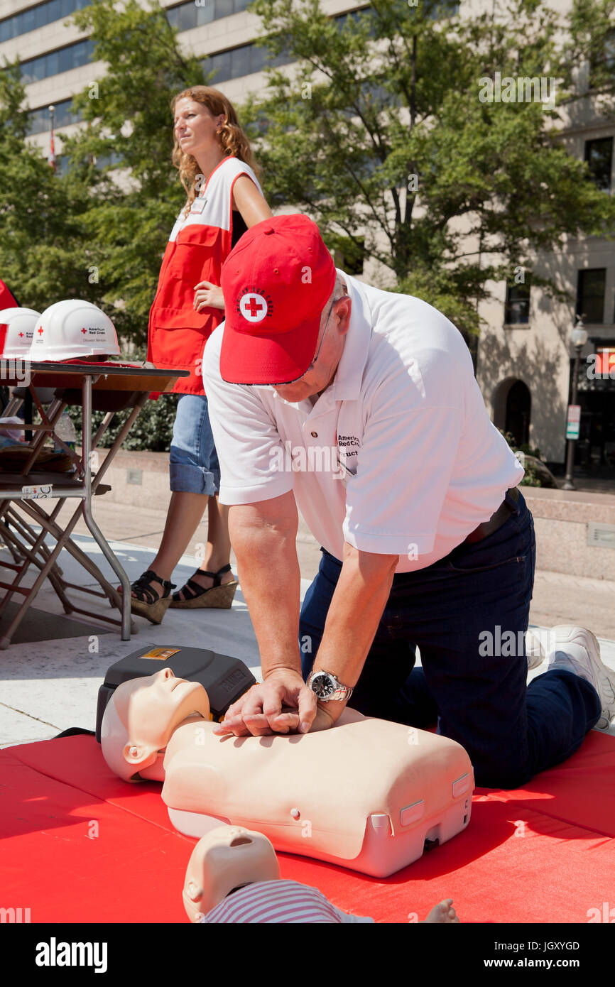 American Red Cross representative during CPR demonstration (CPR training) - USA Stock Photo