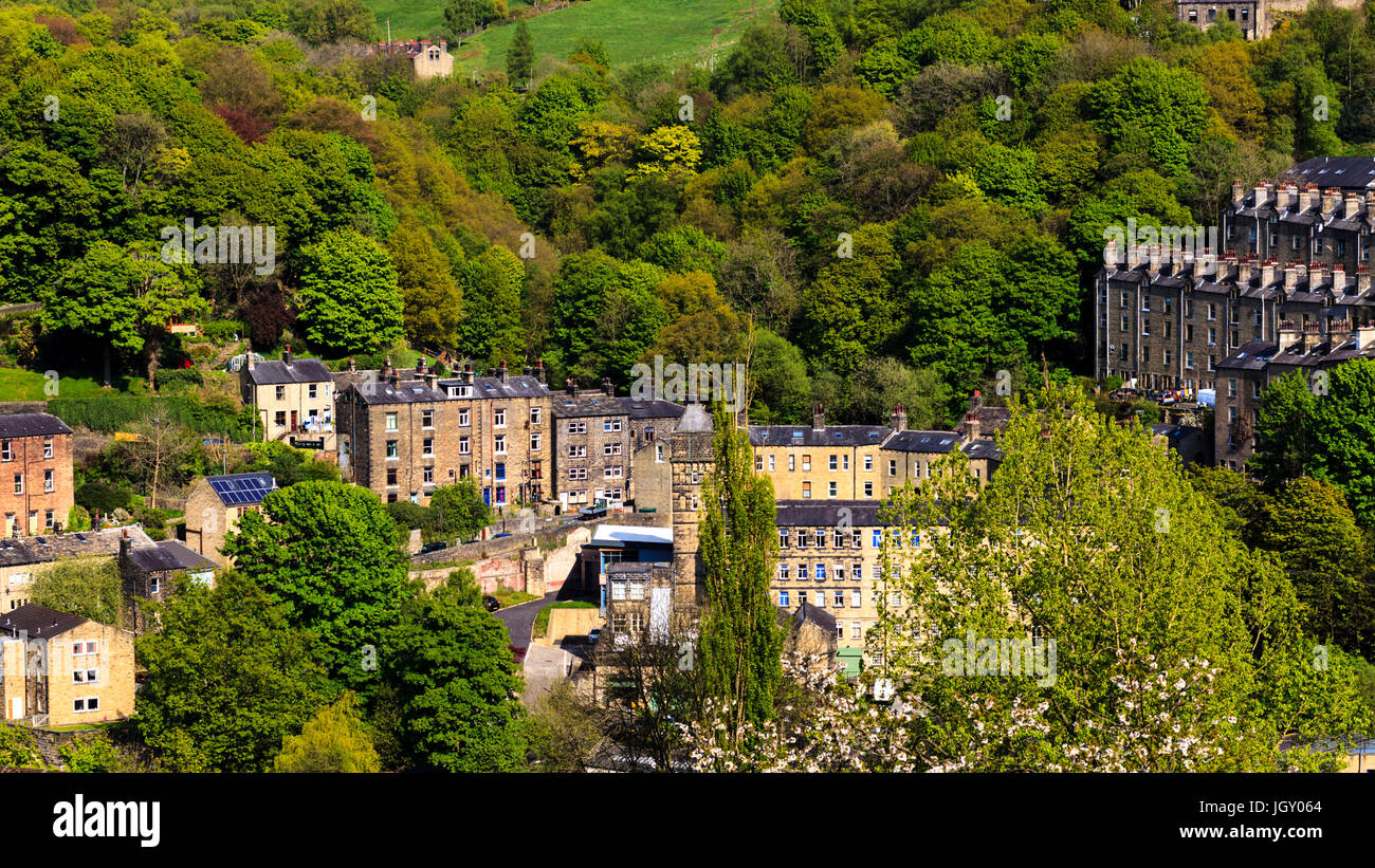 The steep sides of the Calder Valley in Hebden Bridge is dotted with terraced Victorian housing. Stock Photo