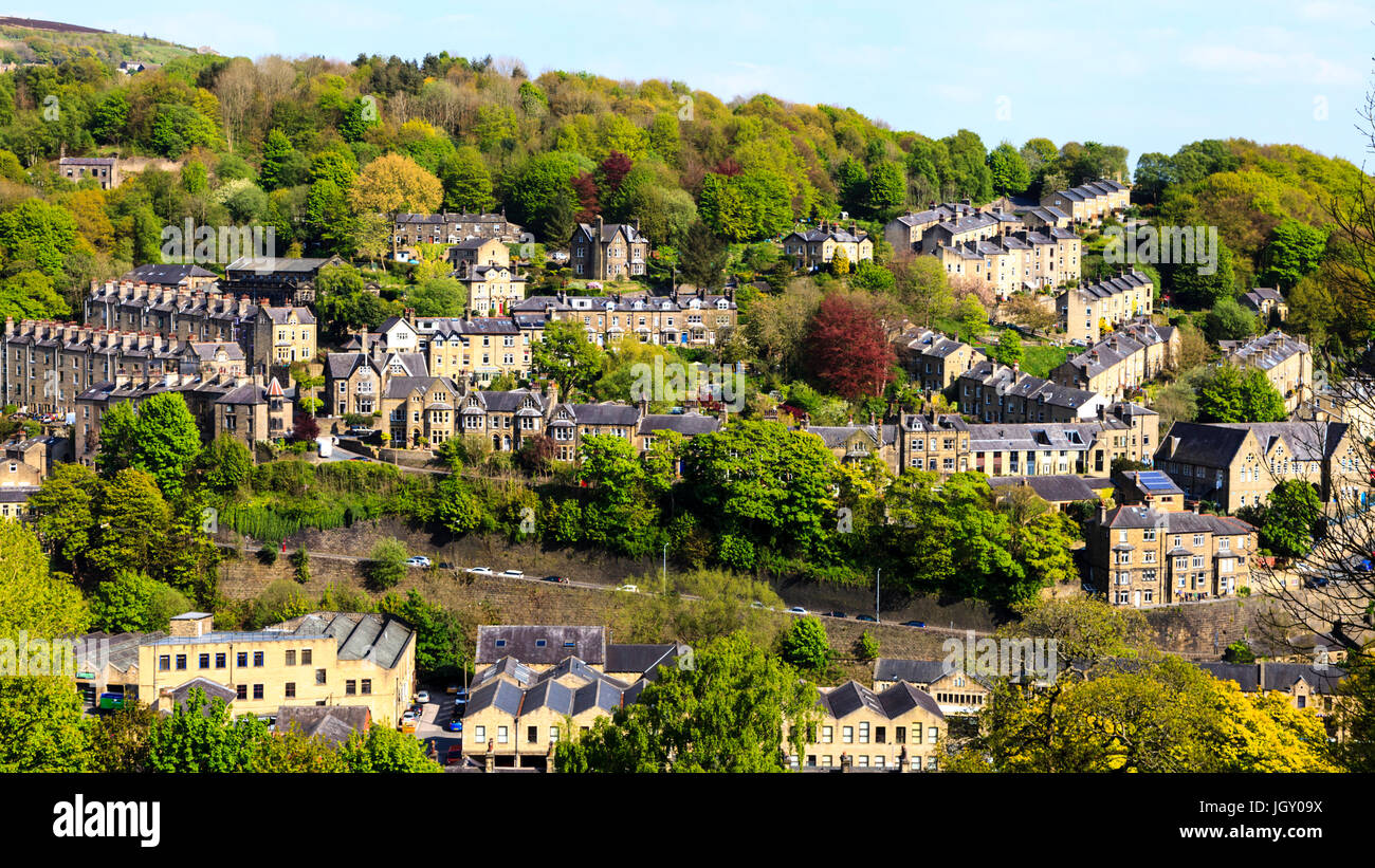 The steep sides of the Calder Valley in Hebden Bridge is dotted with terraced Victorian housing. Stock Photo