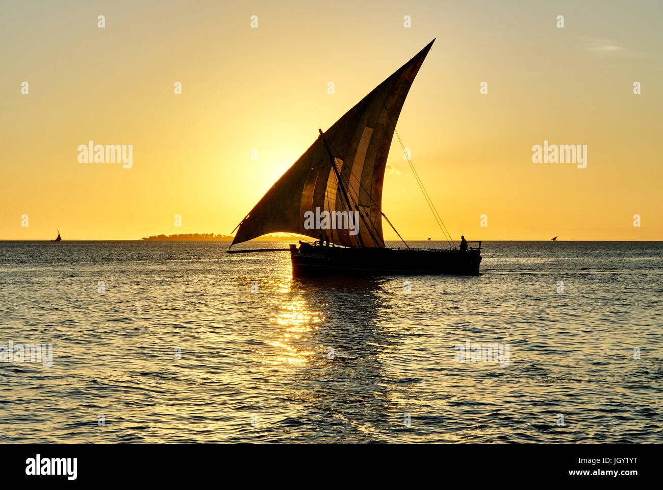 Sunset over boat on sea hi-res stock photography and images - Alamy
