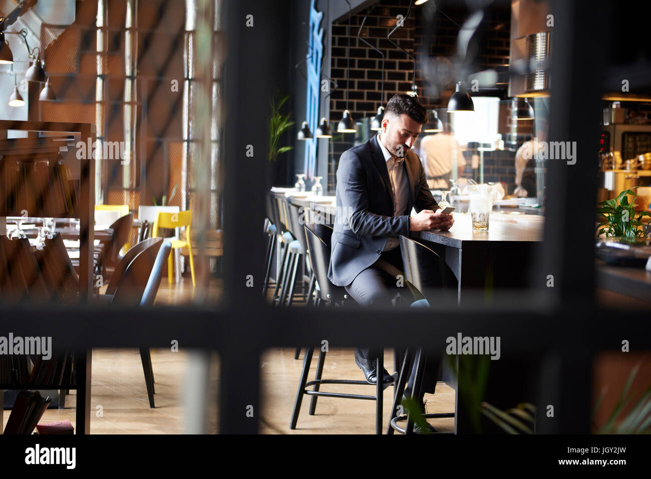 Man sitting bar hi-res stock photography and images - Alamy