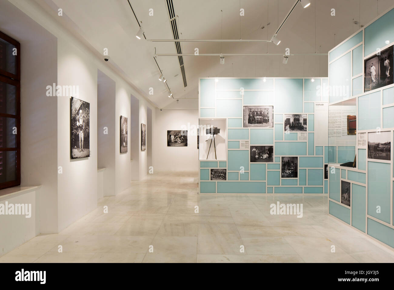 Exhibition space with display of photographs and vintage cameras. Marubi National Museum of
