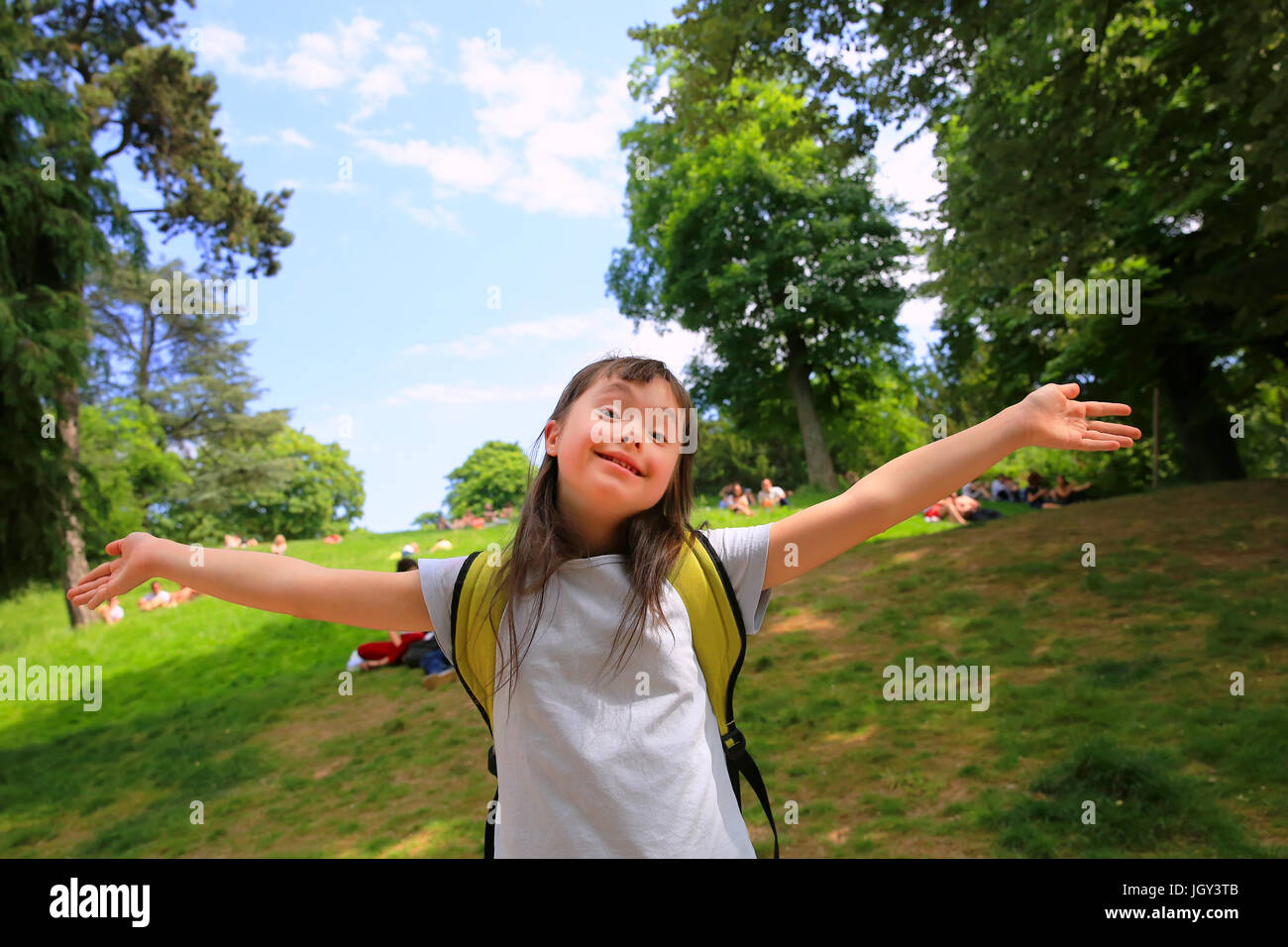 Portrait of little girl smiling outside Stock Photo - Alamy