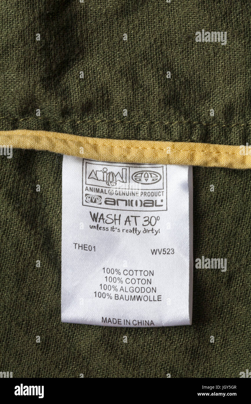 Label in Animal clothing - wash at 30 degrees unless its really dirty 100%  cotton made in China - sold in the UK United Kingdom, Great Britain Stock  Photo - Alamy