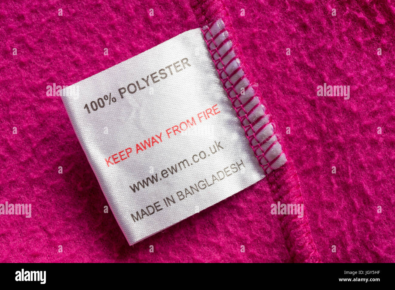 label - 100% polyester keep away from fire made in Bangladesh in girls pink  fleece from The Edinburgh Woollen Mill collection of kids clothing Stock  Photo - Alamy