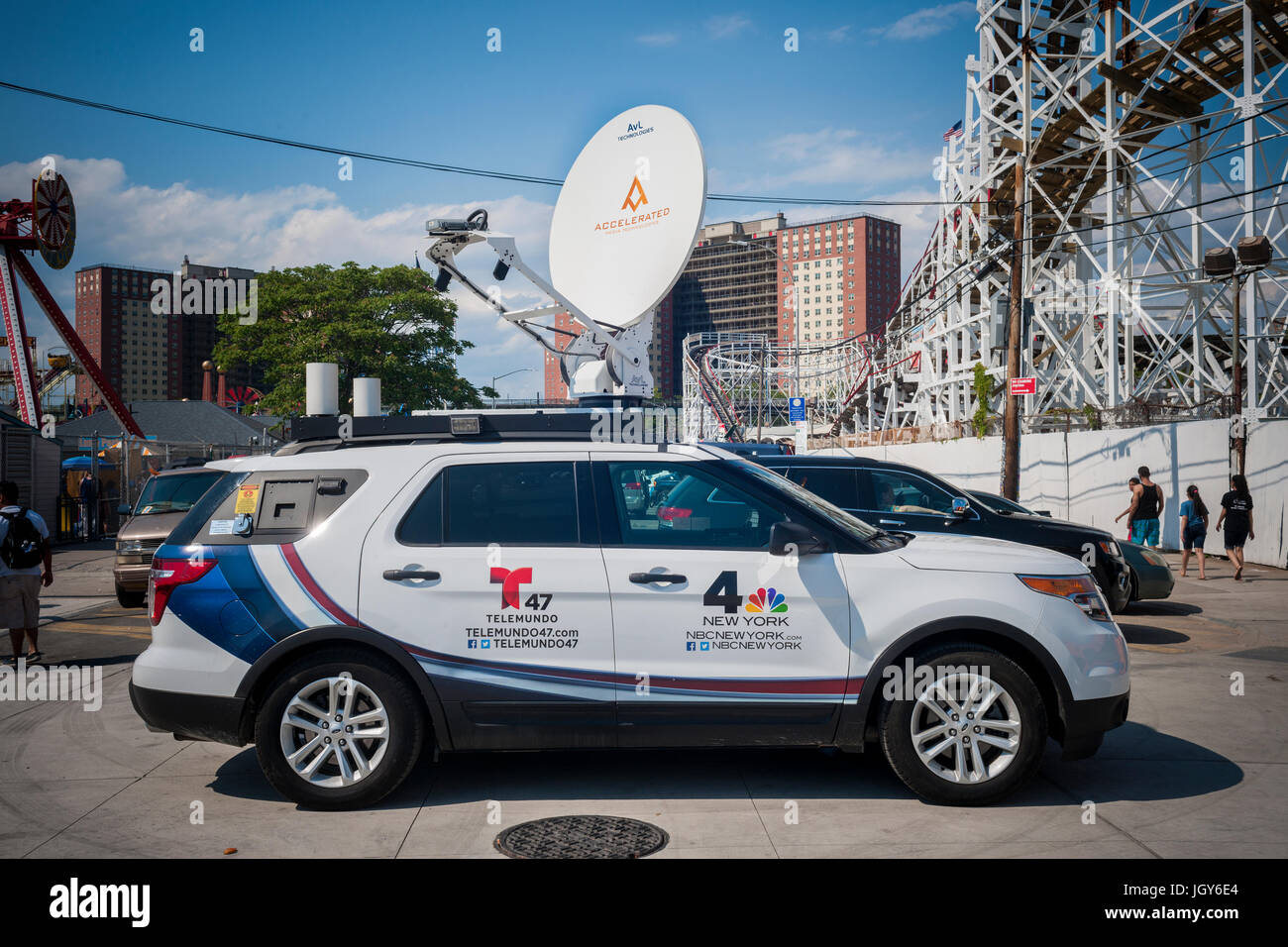 A Telemundo Spanish language television station mobile unit covering Coney Island in Brooklyn in New York on Independence Day, Tuesday, July 4, 2017. Telemundo is owned by NBC Universal. (© Richard B. Levine) Stock Photo