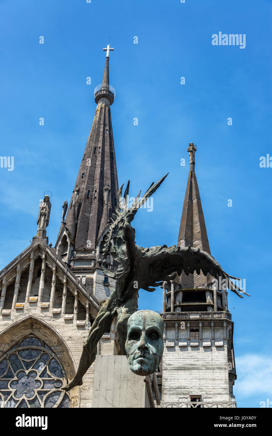 Bolivar Condor statue with Our Lady of Rosary cathedral in the background in Manizales, Colombia Stock Photo