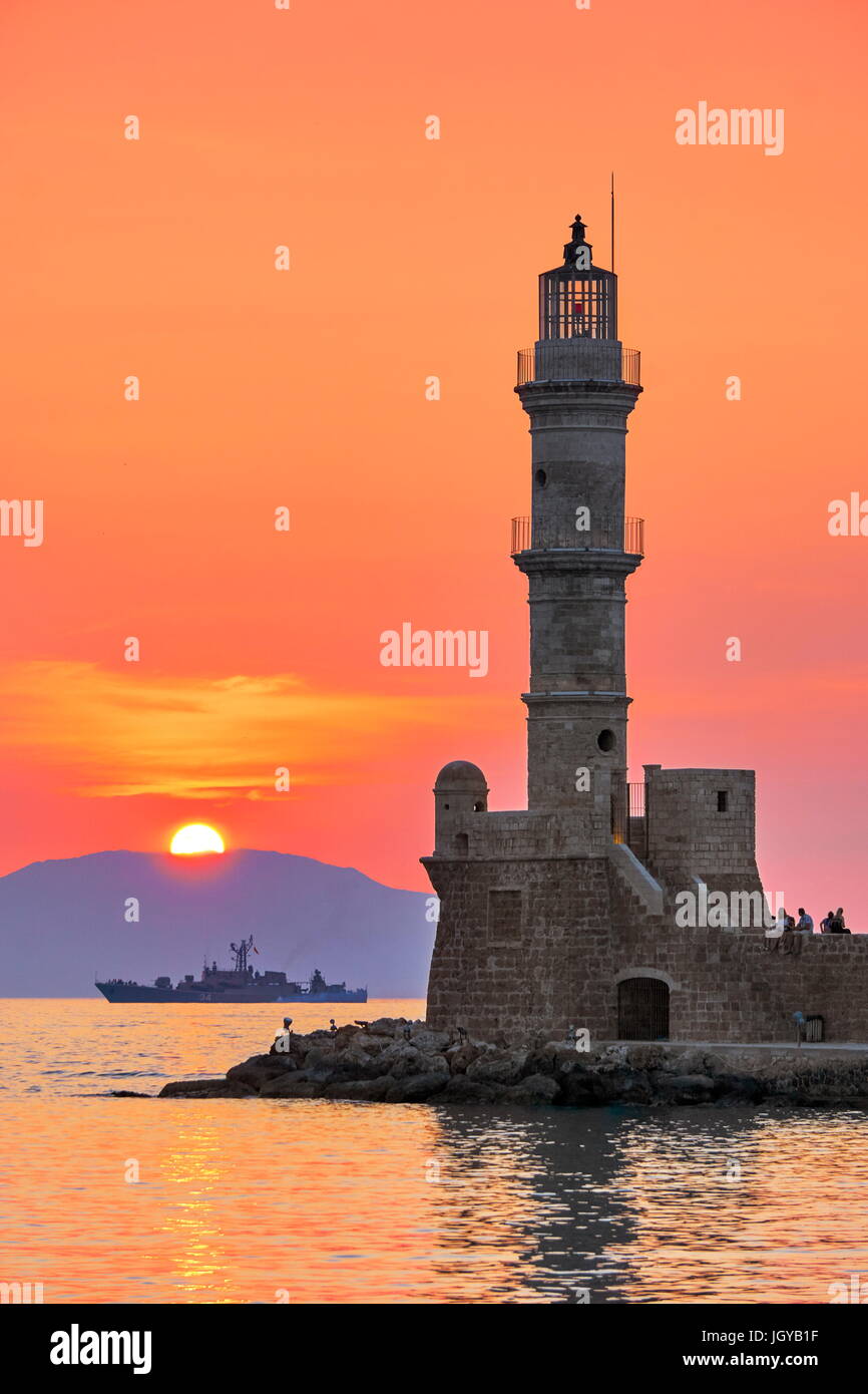 Sunset over the Chania lighthouse, Crete Island, Greece Stock Photo