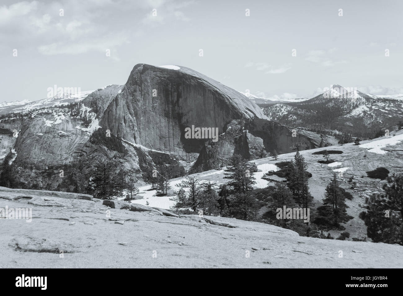 Black and white view of Half Dome and the top of North Dome in Yosemite National Park - Photography by Paul Toillion Stock Photo
