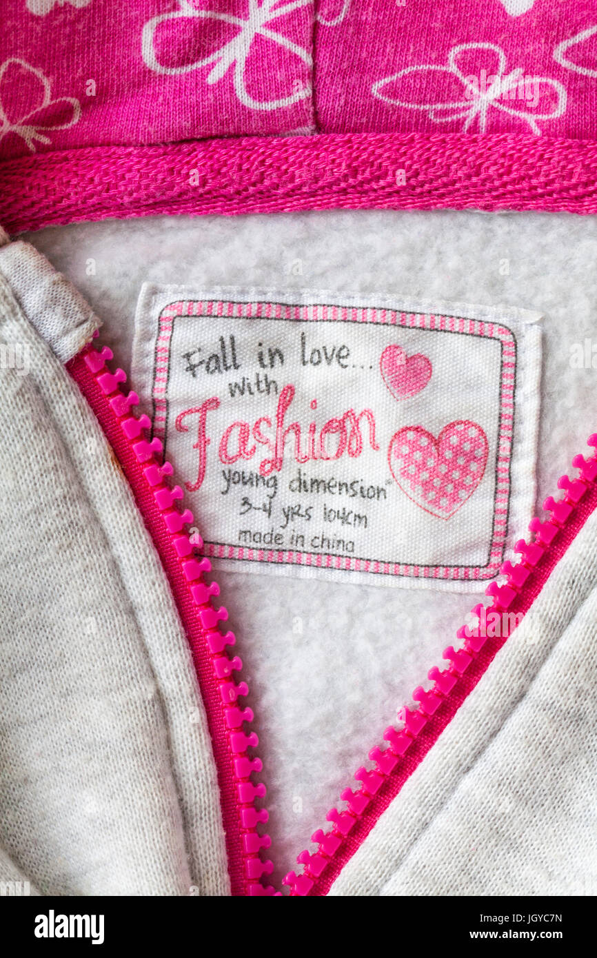Label - Fall in Love with fashion young dimension in girls hoodie 3-4 yrs made in China - sold in the UK United Kingdom, Great Britain Stock Photo
