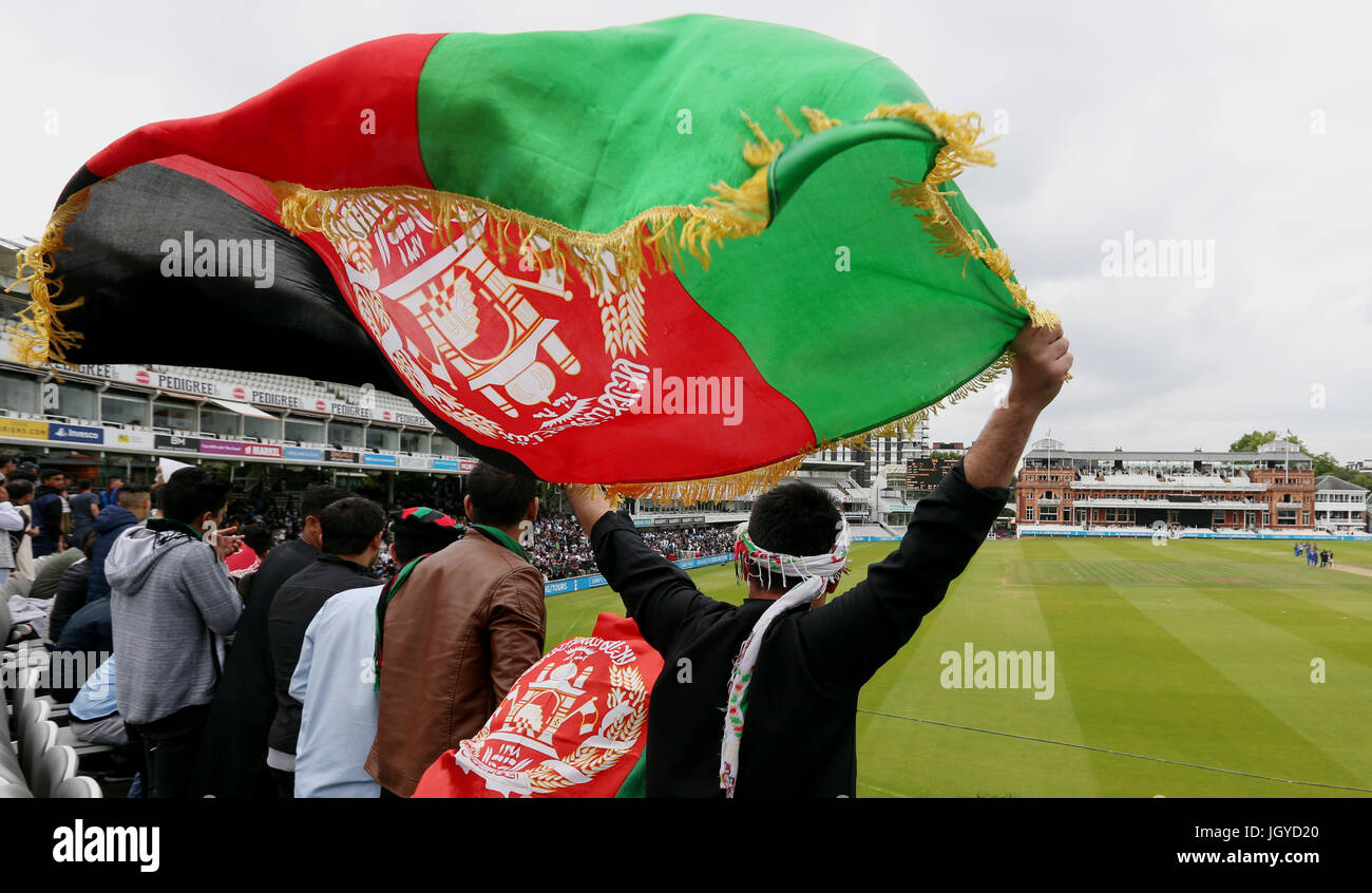 Afghanistan cricket fans watch from the stands during the one day match between MCC and Afghanistan at Lord's, London. Stock Photo