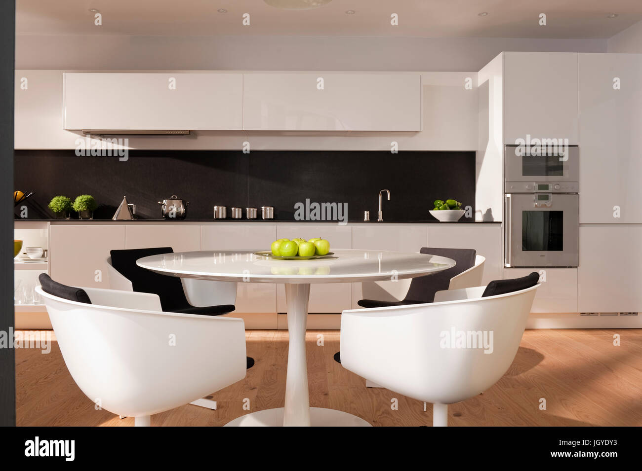 Modern open plan kitchen and dining area Stock Photo
