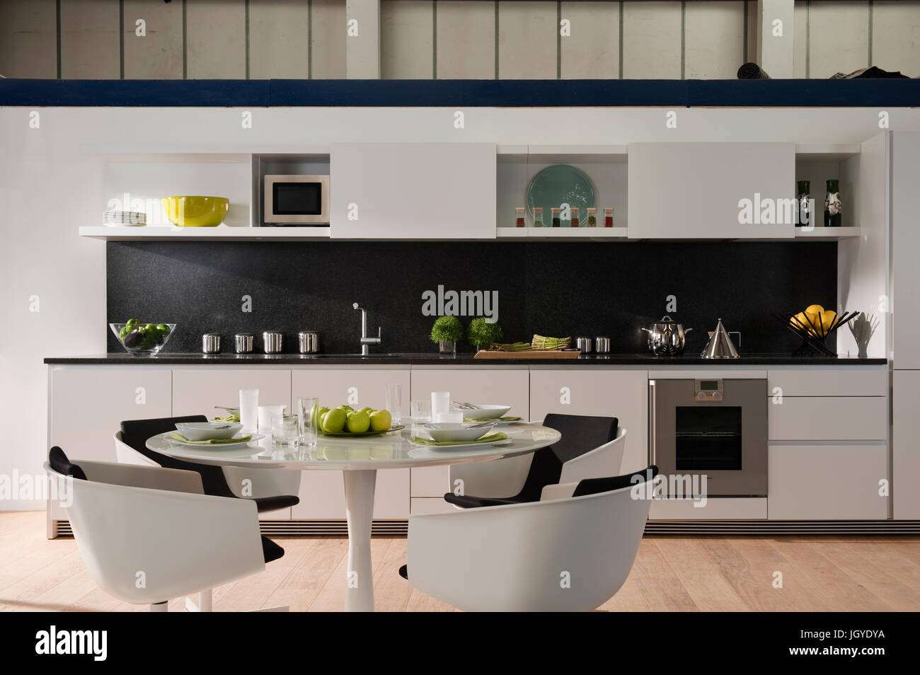 Modern open plan kitchen and dining area Stock Photo