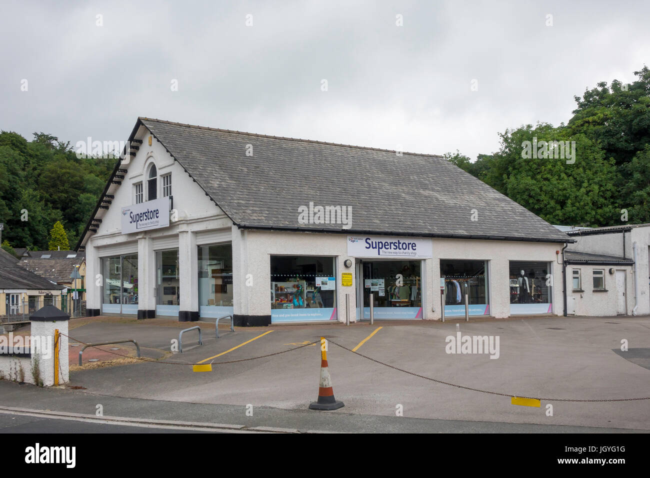 Age UK Ltd New Style Charity Shop Superstore at Grange-over-Sands, Cumbria Stock Photo