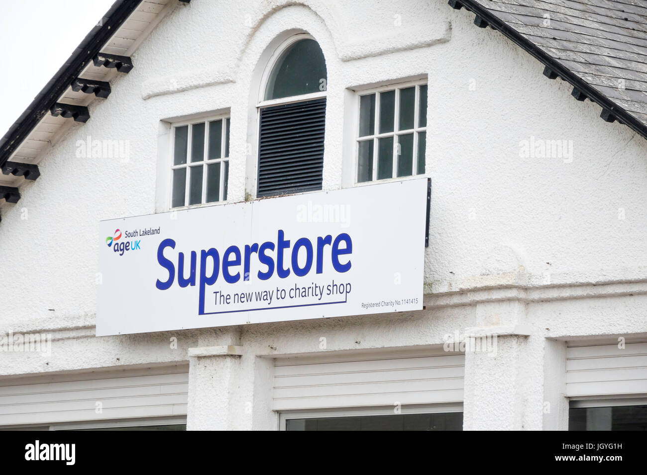 Age UK Ltd New Style Charity Shop Superstore sign detail Stock Photo