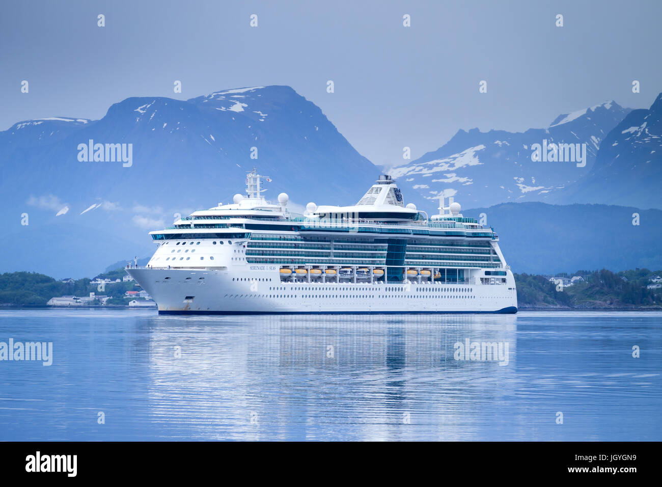 SERENADE OF THE SEAS inbound Alesund, a Radiance class cruise ship, that is owned and operated by Royal Caribbean International cruise line. Stock Photo