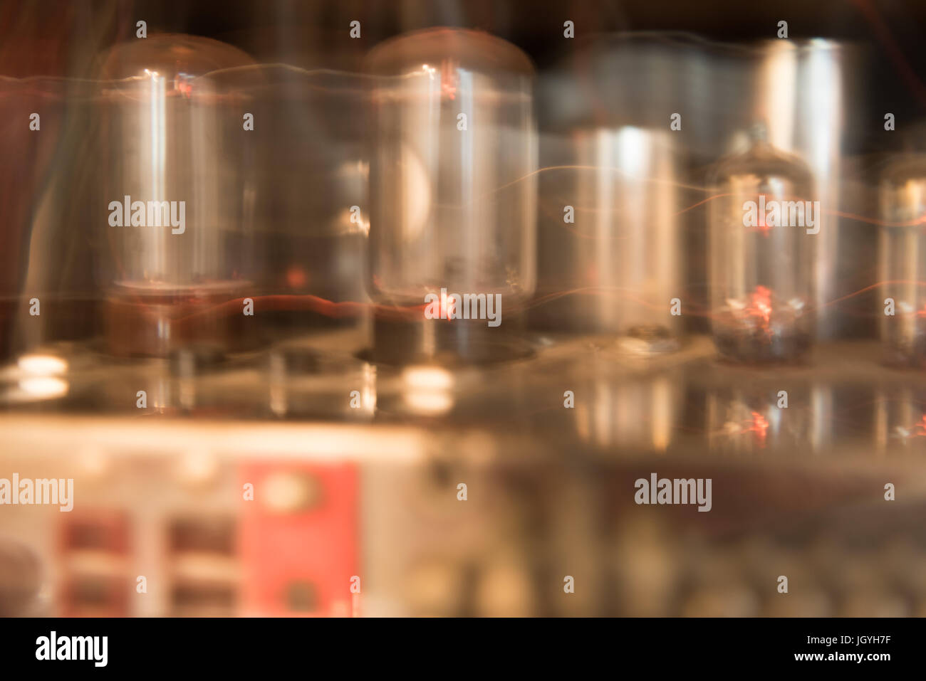 Glowing Tubes of a Tube Amplifier creating a warm light Stock Photo Alamy