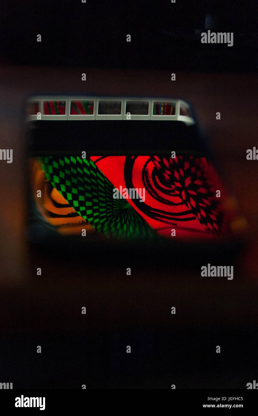Reflection from a computer monitor to a mobile phone Stock Photo - Alamy