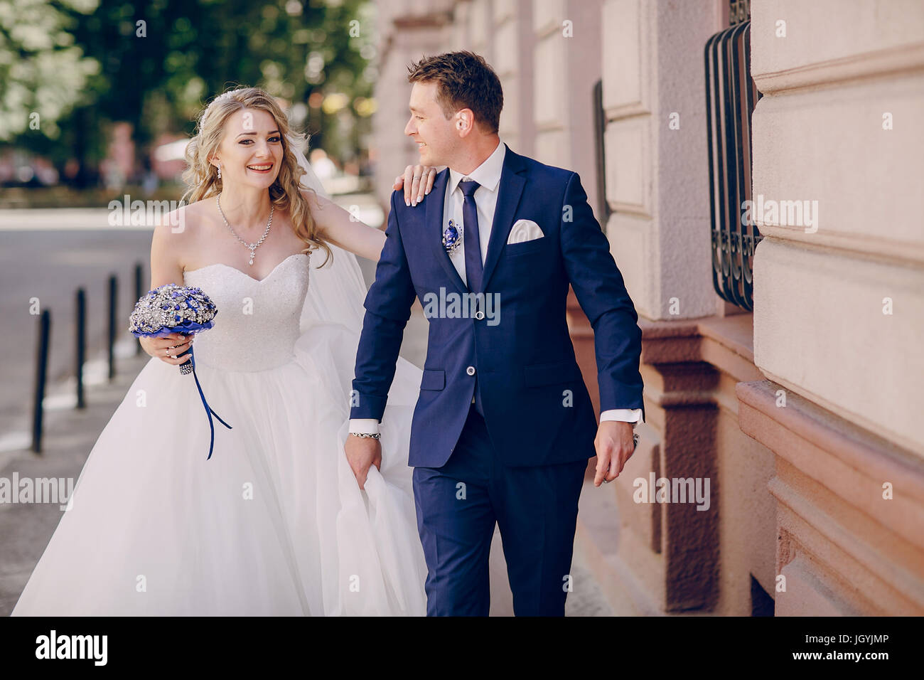 Bride groom walk around city hi-res stock photography and images - Alamy