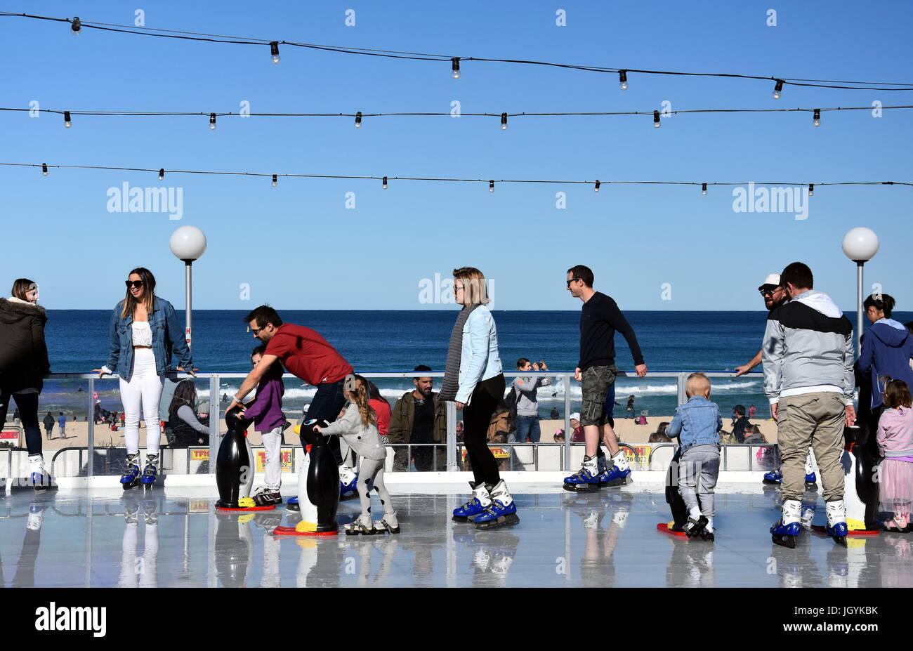 Sydney, Australia Jul 9,, 2017. Kids and parents ice skating with a