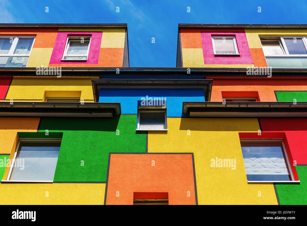 picture of a colorful facade of an apartment building Stock Photo - Alamy