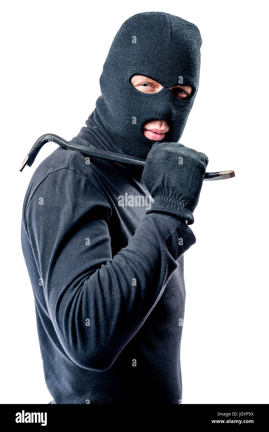 Man wearing balaclava and holding crowbar Stock Photo - Alamy