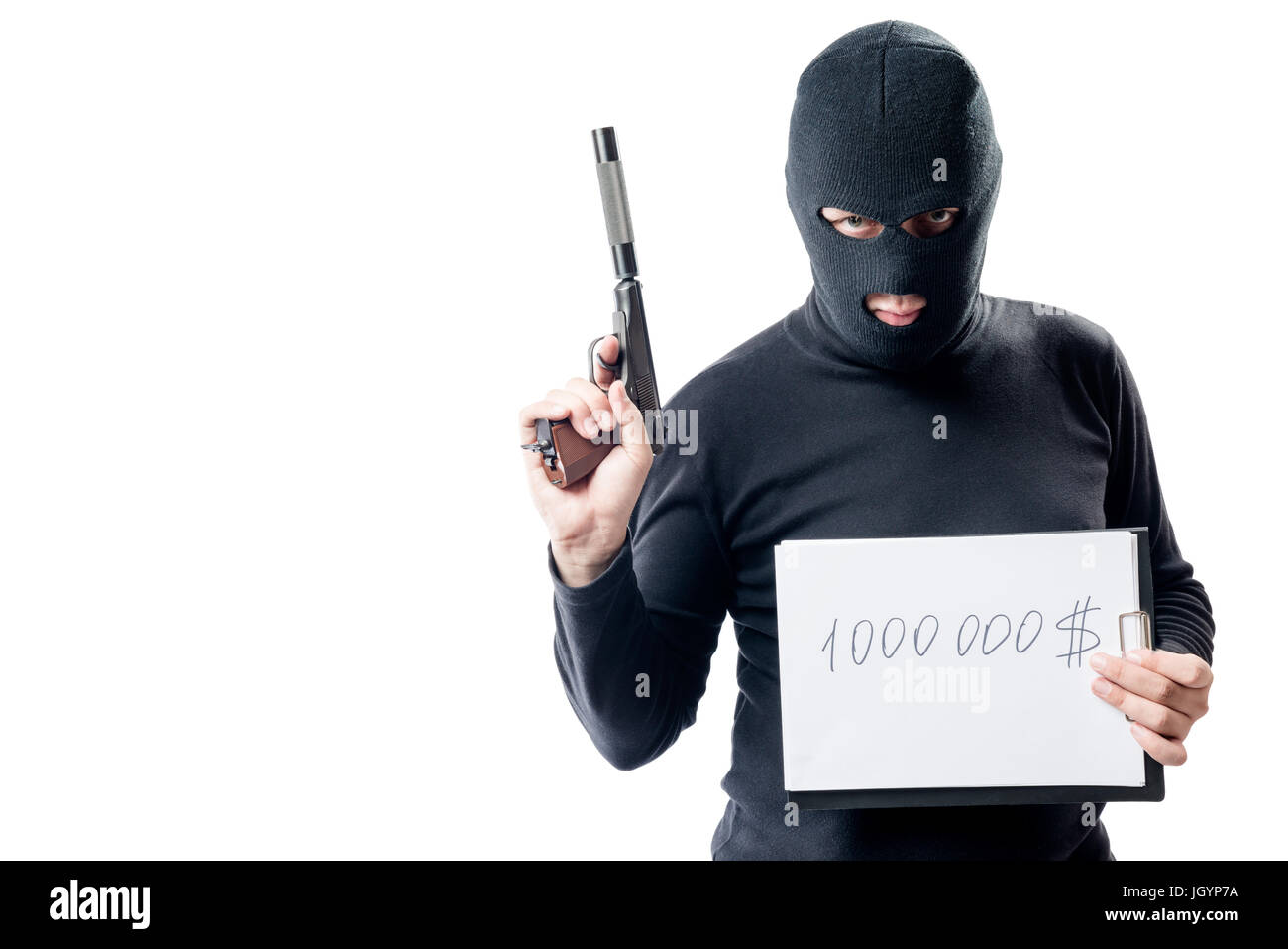 thief with the weapon shows the sum of the ransom for the hostage Stock Photo